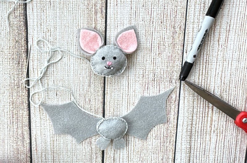 ladder stitch to attache felt bats head to the body