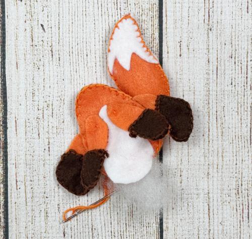 Stuffing the felt fox