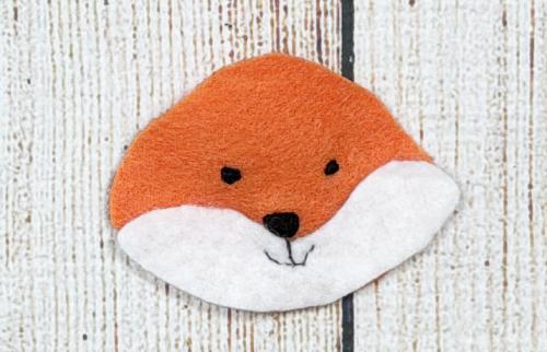 Adding the face to the felt fox