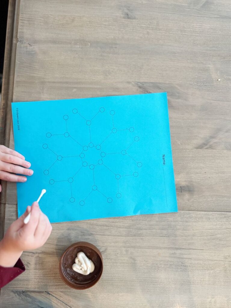 toddler painting a snow flake free printable