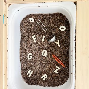 Letter sensory bin for tactile alphabet play