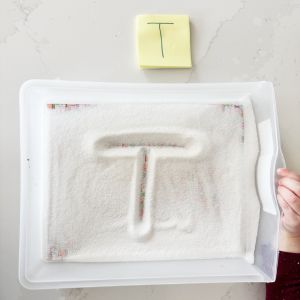 Salt writing tray for tracing letters with fingers