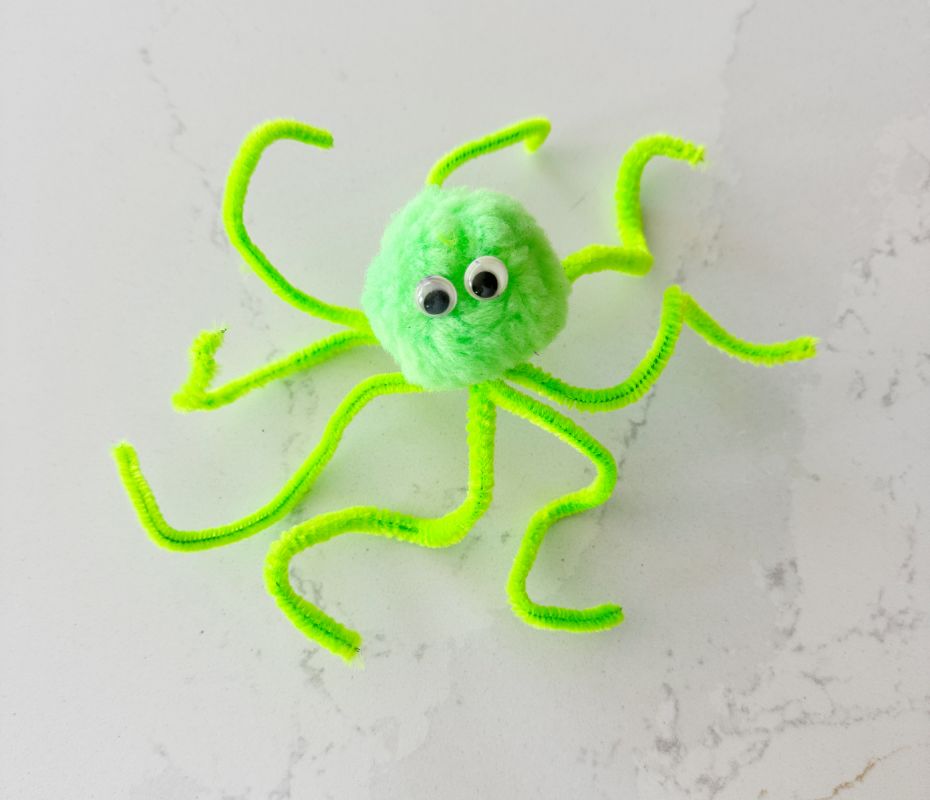 Letter O is for Octopus craft made out of pipe cleaners, a pom pom and googly eyes.