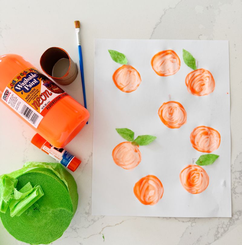 Letter O is for Orange Orchard Stamp Activity using a paper tube stamp and craft paper stems
