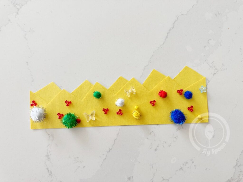Letter Q is for Queens Crown easy activity idea. Cut out craft paper into a crown and decorate it, then staple the sides of it together so kids can wear it. Suitable for preschool and kindergarten.