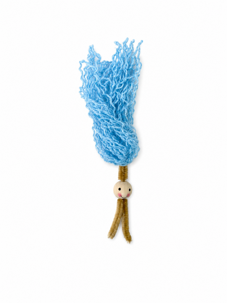 Creating curly yarn hair for a beginner fiber art mermaid.