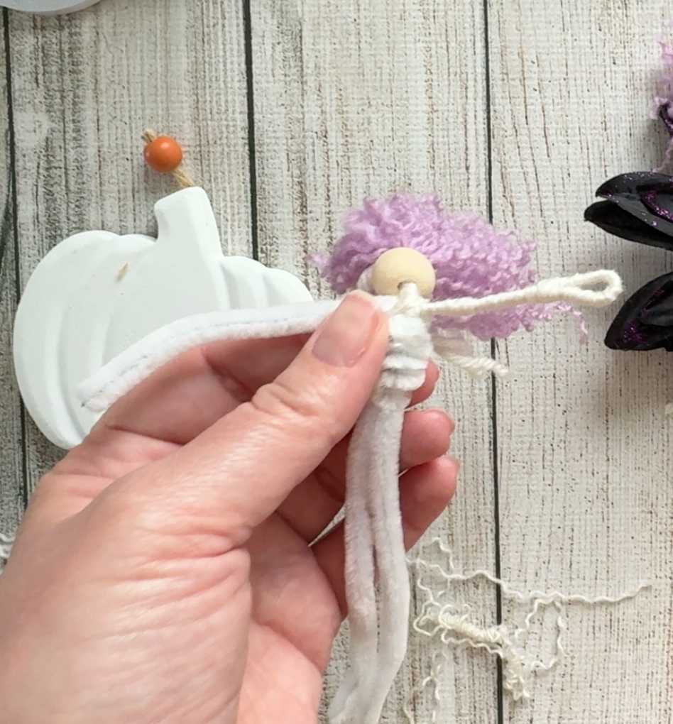 Easy Dollar Tree Halloween Craft Make a Witch tutorial - Wrapping the Arms