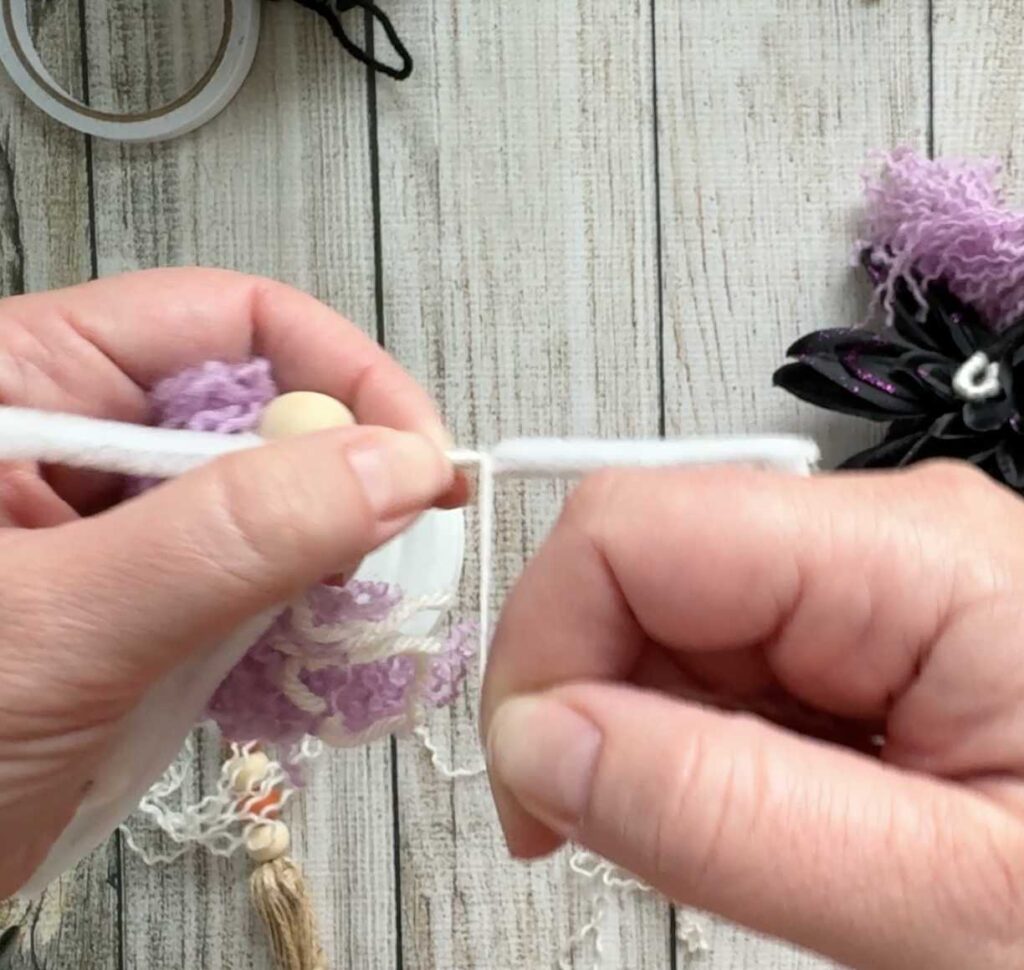 Easy Dollar Tree Halloween Craft Make a Witch tutorial - Wrapping the Arms